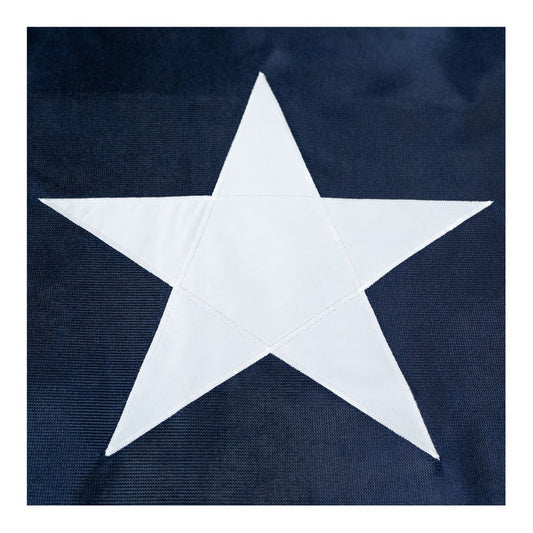Super Tough Texas Flag 3ft x 5ft Sewn Polyester - Secondary Image - United States Flag Store Close up of a Texas state flag featuring the white star on blue fabric