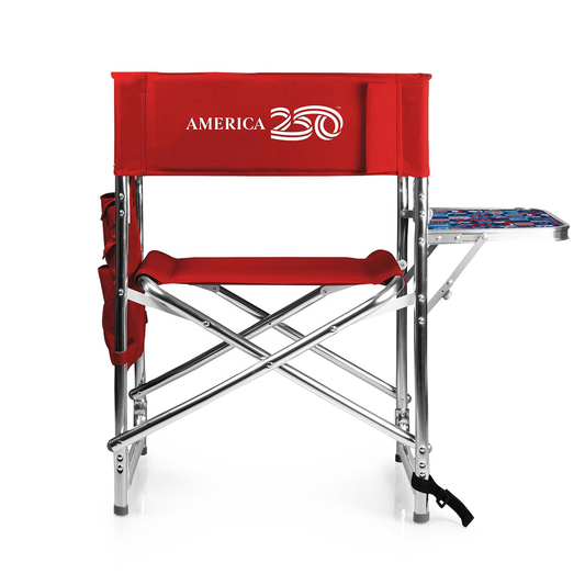 Red folding chair with a table and 'America 250' logo on a white background