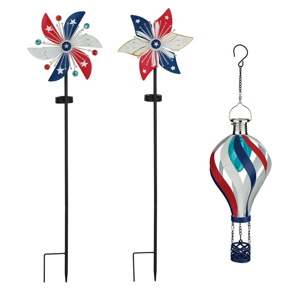 Patriotic garden decoration set featuring two metal pinwheel stakes with red, white, and blue star designs and a matching hot air balloon hanging ornament, shown on a plain white background.