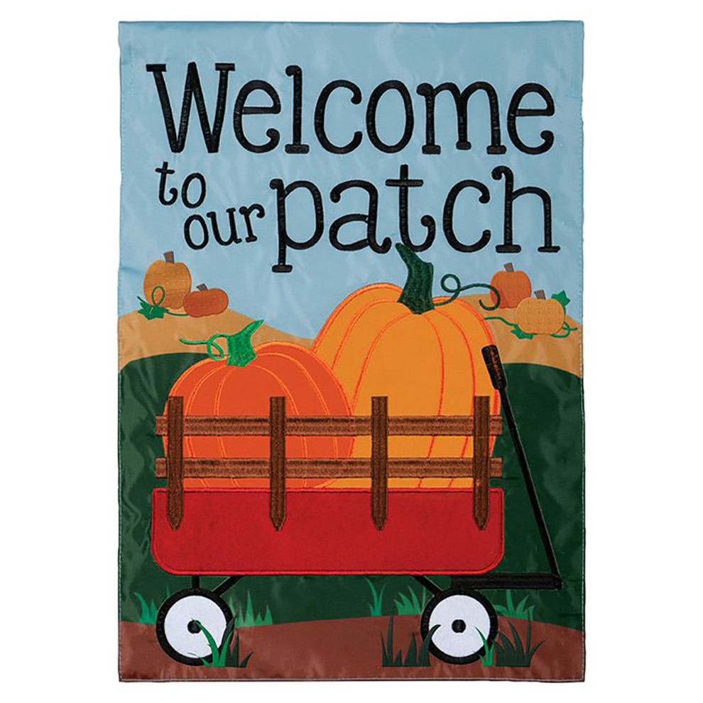 Decorative garden flag with pumpkins and a wagon, featuring the text 'Welcome to our patch'.