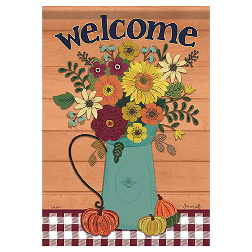 Decorative flag with flowers, pumpkins, and 'welcome' text on a wooden background