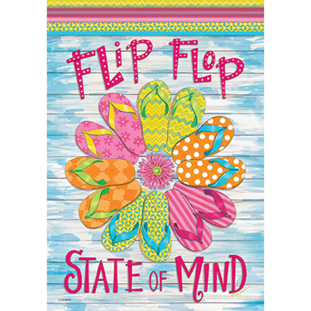 Colorful decorative flag with flip-flops with text 'Flip Flop State of Mind' on a blue wooden background