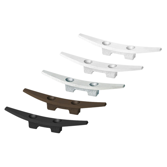 Set of five metal cleats in different colors on a white background