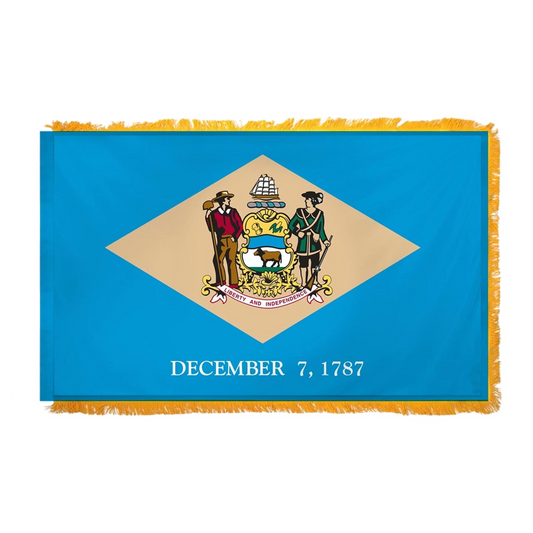 State of Delaware flag featuring the colonial blue field, central buff diamond, state coat of arms, and 'December 7, 1787' text. This flag features yellow fringe.