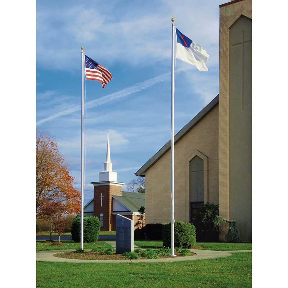 Church with American flag and another flag on a clear day