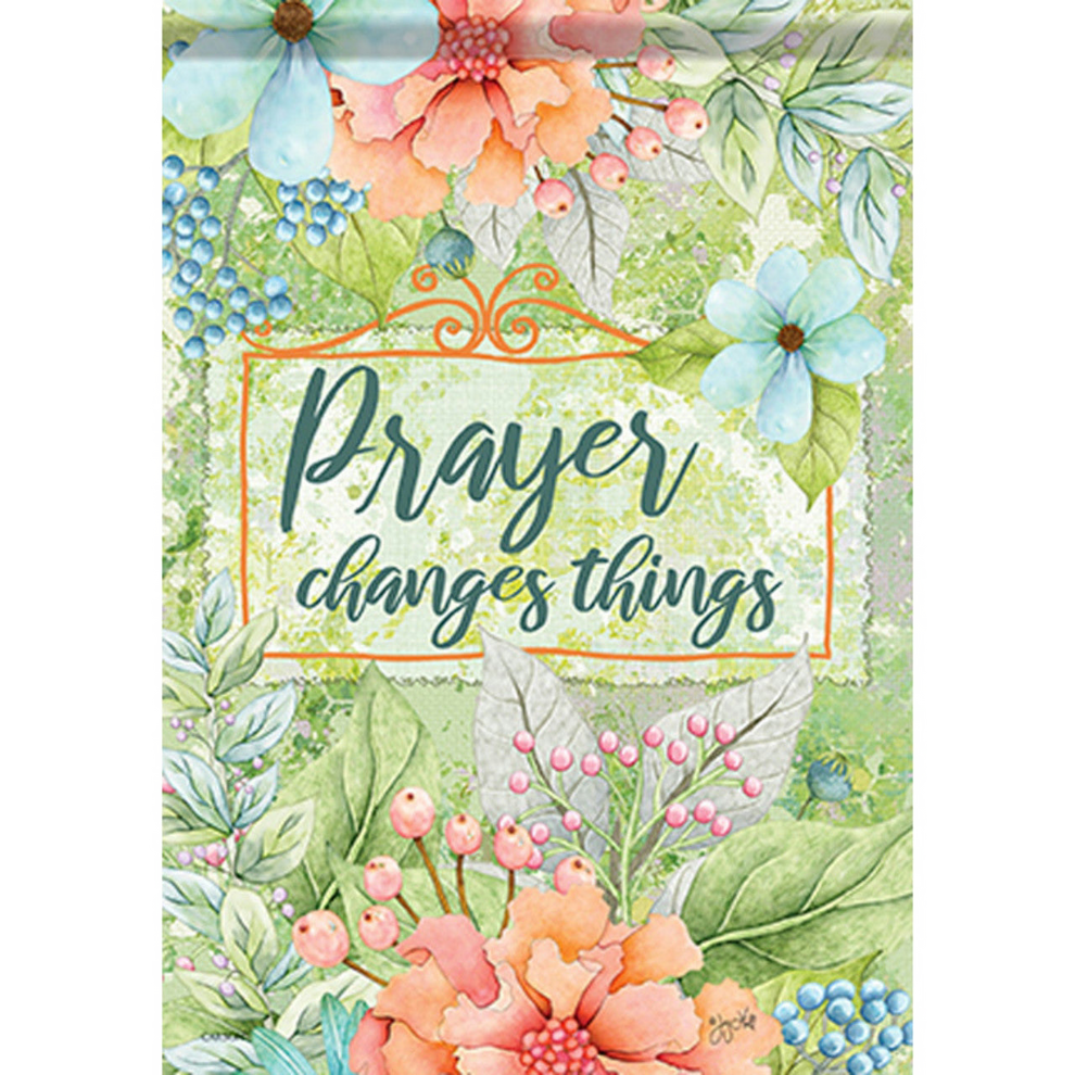 Floral decorative flag with 'Prayer changes things' text on a green background