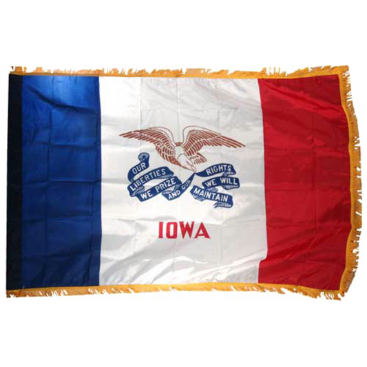 State of Iowa flag featuring three vertical stripes of blue, white, and red, with the center white stripe being wider than the outer two. In the center white field, a bald eagle flies carrying a long, waving blue streamer in its beak that reads 'OUR LIBERTIES WE PRIZE AND OUR RIGHTS WE WILL MAINTAIN'. Directly below the streamer, the word 'IOWA' is printed in large, red all-caps letters. This flag features yellow fringe.