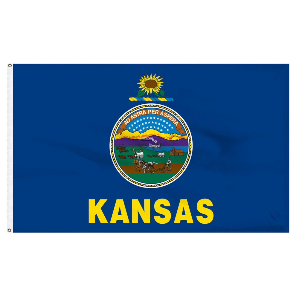 State of Kansas blue flag with Kansas state seal in the center, depicting a landscape with a rising sun, a steamship, a settler plowing a field, a covered wagon train, and Native Americans hunting buffalo. Above the scenery is the Latin motto 'AD ASTRA PER ASPERA'. Above the seal sits a gold and blue sunflower twist, and the word 'KANSAS' is printed in large, gold all-caps letters directly below the seal.