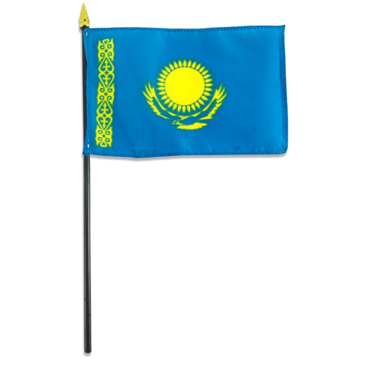 Flag of Kazakhstan with a blue background and yellow sun shaped emblem