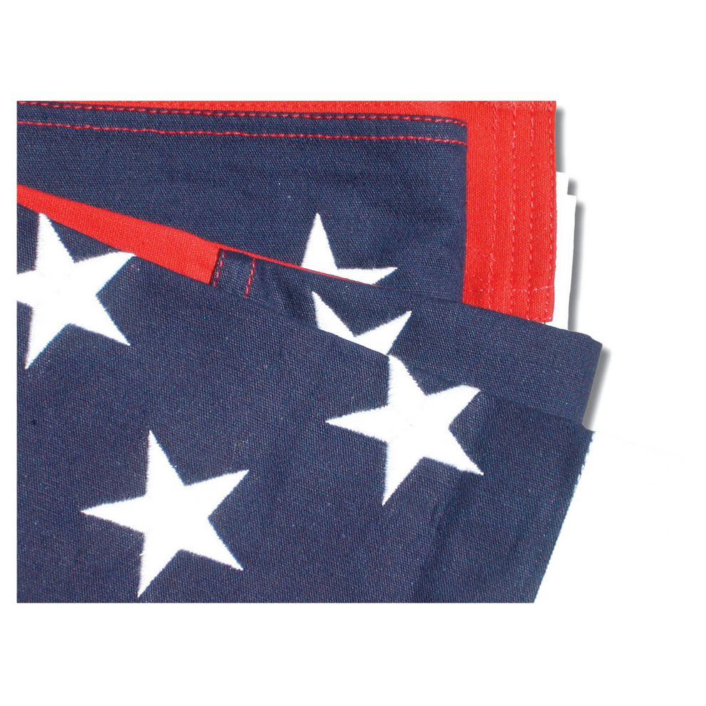 Folded American flag with blue canton and white stars and red stripe showing
