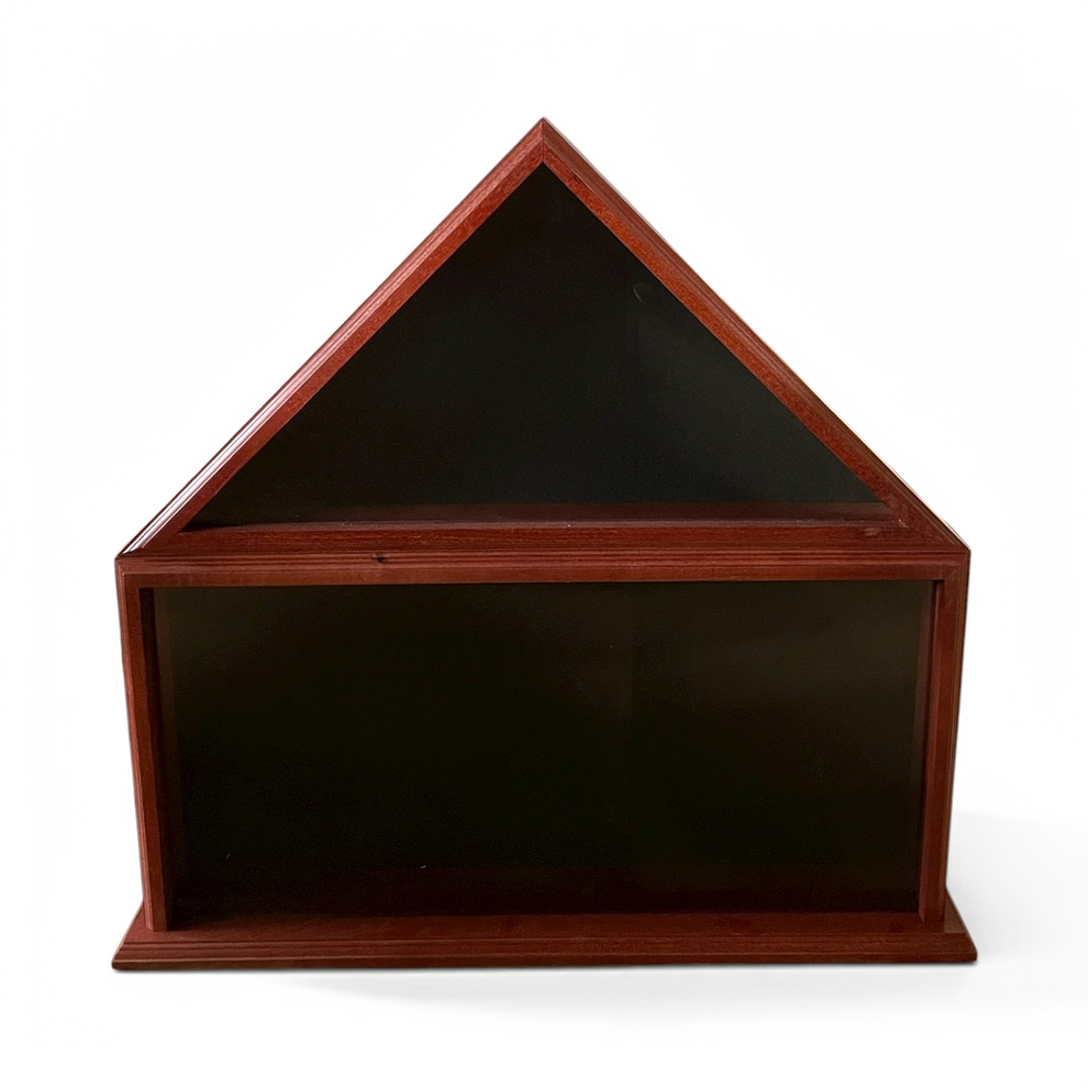 Wooden display case with a black interior on a white background