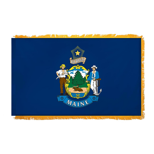 State of Maine blue flag featuring the full-color state seal with a moose, pine tree, farmer, and sailor on a blue field with text 'DIRIGO' and a yellow star. Flag features yellow fringe.