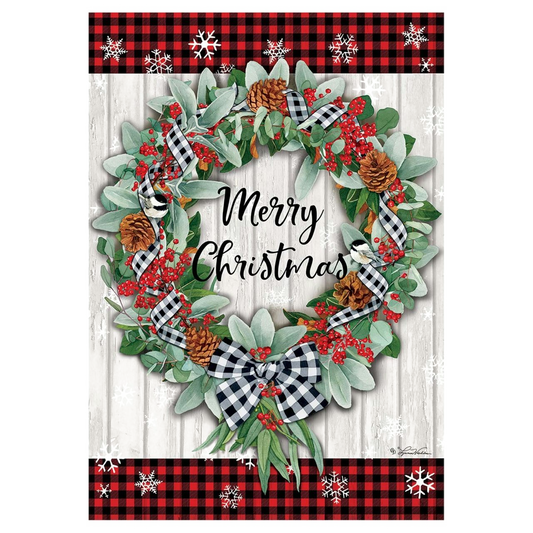 Decorative flag with Christmas wreath with berries, pinecones, and plaid ribbons on a white background with red and black checkered border.