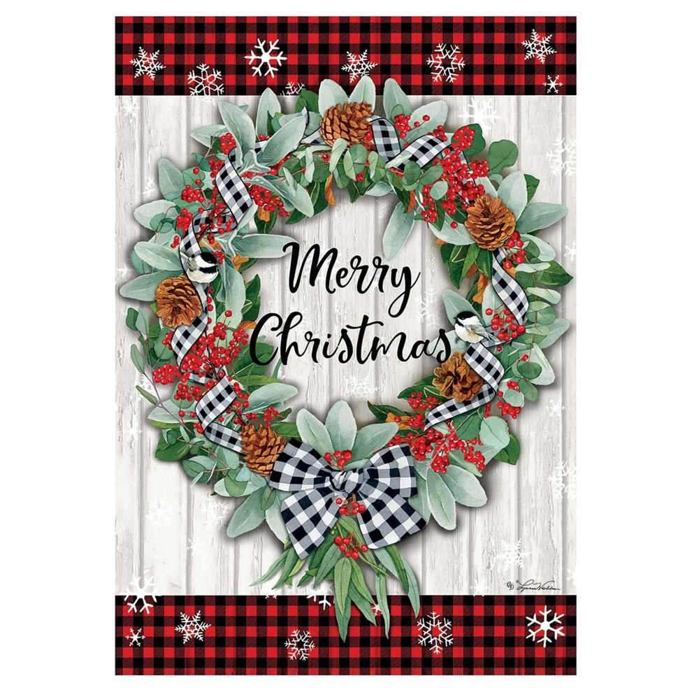 Decorative flag with Christmas wreath with berries, pinecones, and plaid ribbons on a white background with red and black checkered border.