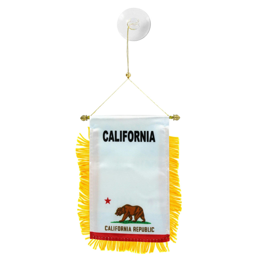 Small California state flag with yellow fringe on a white background