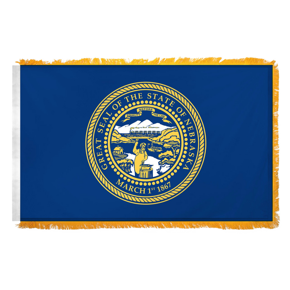 State of Nebraska state flag featuring the gold and silver state seal with the motto 'Equality Before the Law' on a solid dark blue field. Seal includes a steamboat on a river, a train moving across mountains, a blacksmith at work, and a settler's cabin. This flag features yellow fringe.