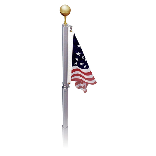 A telescoping aluminum flagpole with a United States flag flying on it. The flagpole is extended and the flag is displayed showing red and white stripes and white stars on a blue background.