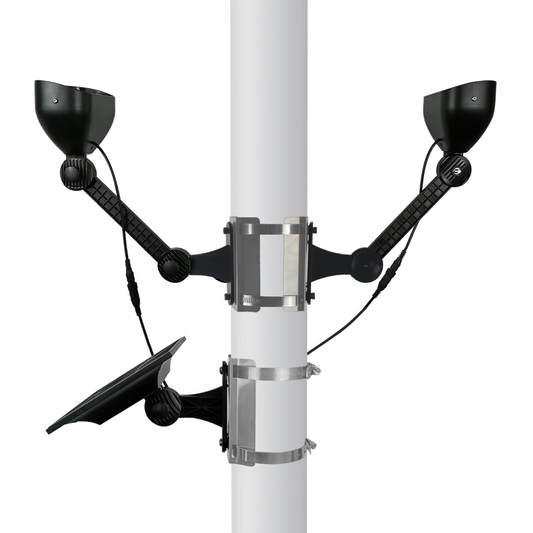 Close up of a black solar powered flagpole light system with two lights and a solar panel on a flagpole. Image is on a white background.