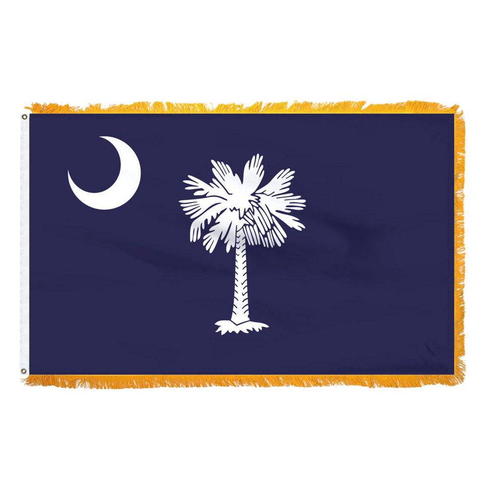South Carolina state flag with a white palmetto tree and moon on a blue background