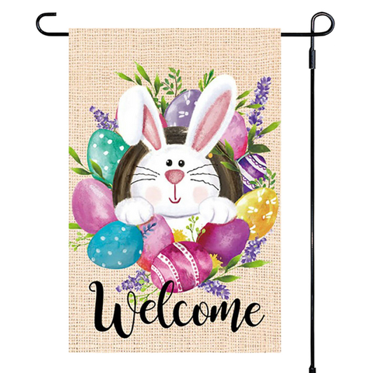 Easter-themed garden flag with a bunny, eggs, and 'Welcome' text on a burlap background.