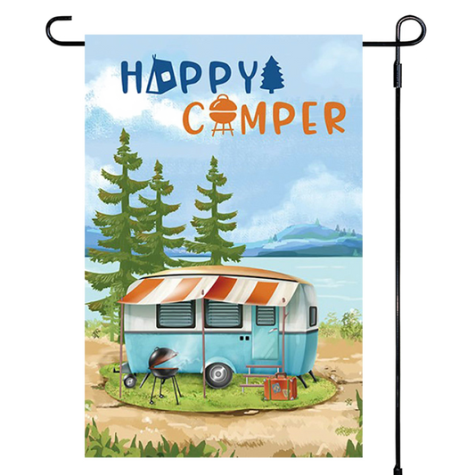 Decorative garden flag with a camper and 'Happy Camper' text against a scenic background.
