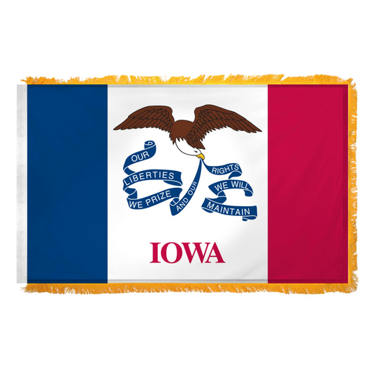 State of Iowa flag featuring three vertical stripes of blue, white, and red, with the center white stripe being wider than the outer two. In the center white field, a bald eagle flies carrying a long, waving blue streamer in its beak that reads 'OUR LIBERTIES WE PRIZE AND OUR RIGHTS WE WILL MAINTAIN'. Directly below the streamer, the word 'IOWA' is printed in large, red all-caps letters. this flag features yellow fringe.