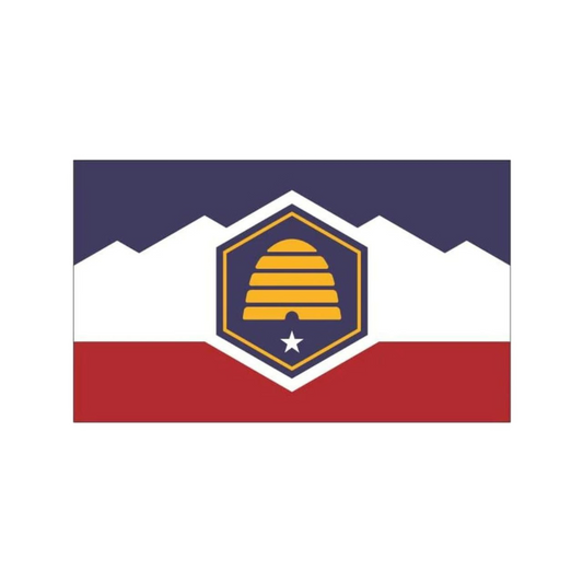 New Utah state flag with a central emblem featuring a beehive design on a blue, white, and red background.