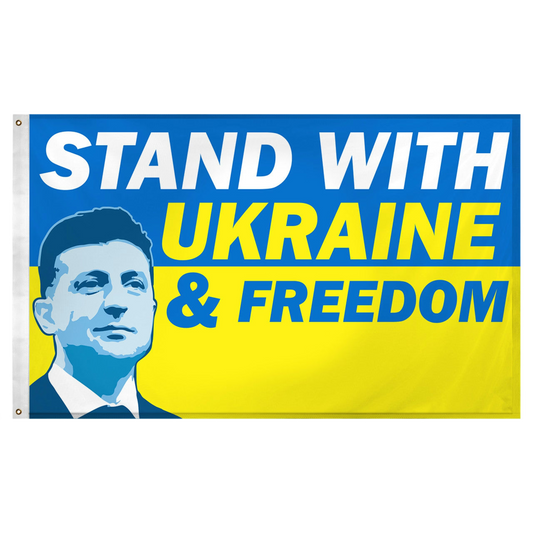 Flag with a portrait of a President Zelenskyy and text 'Stand with Ukraine & Freedom' on a blue and yellow background