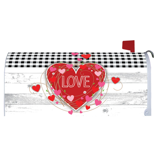 Mailbox cover with a heart design and 'LOVE' text on a checkered background