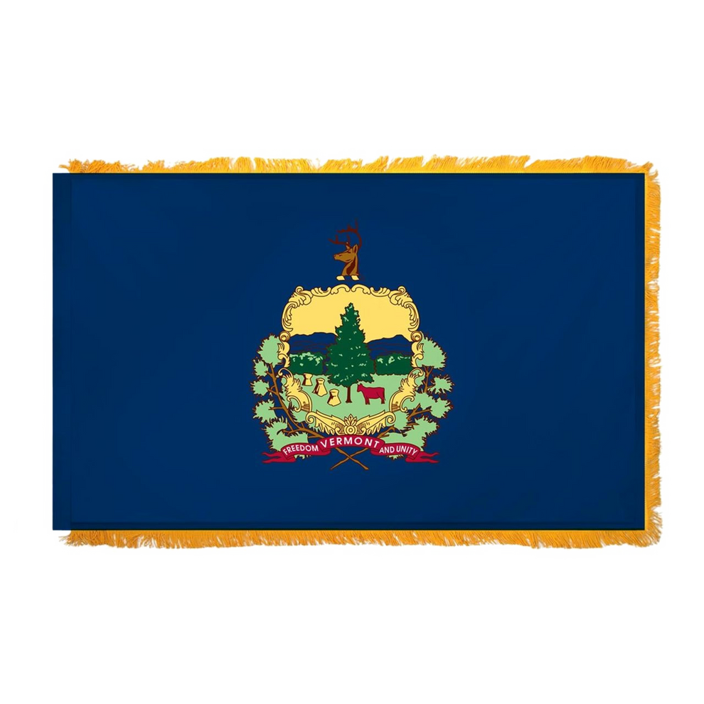 Vermont state flag featuring the full-color state coat of arms and 'Vermont, Freedom and Unity' motto on a solid azure blue field. This flag has fringe on the edges.