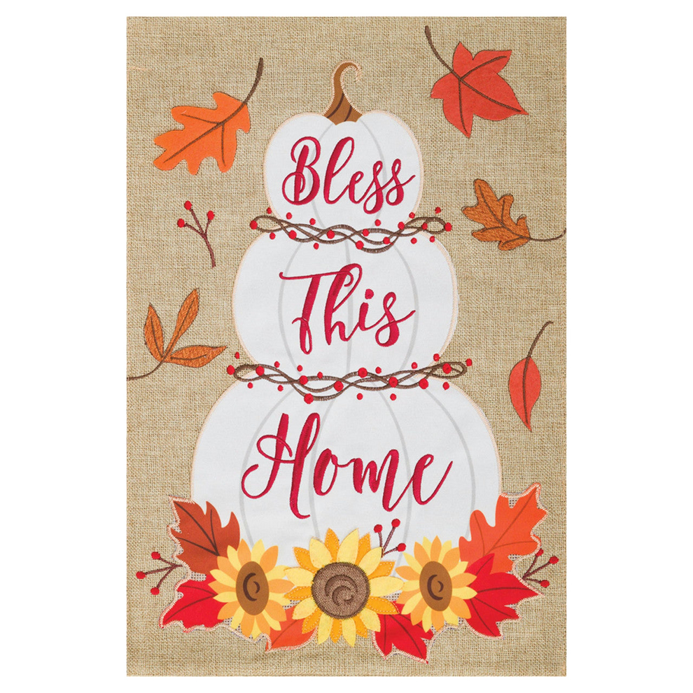 Decorative banner with 'Bless This Home' text, pumpkins, and autumn leaves on a burlap background.