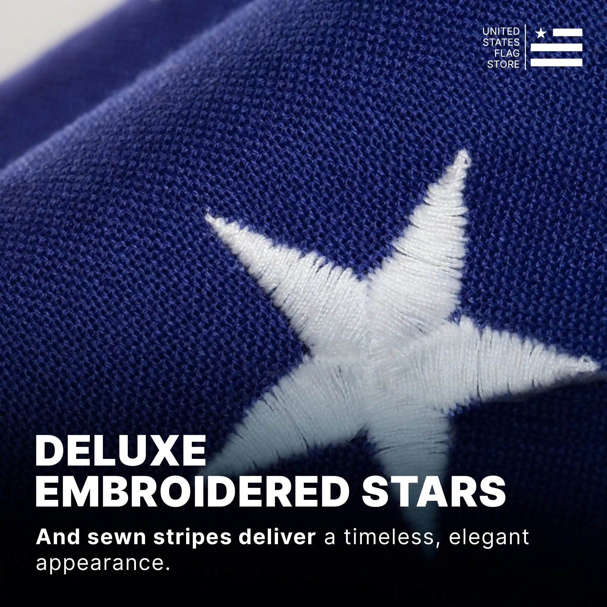 Close-up of a deluxe white embroidered star on navy blue spun polyester fabric with visible high-quality stitching.