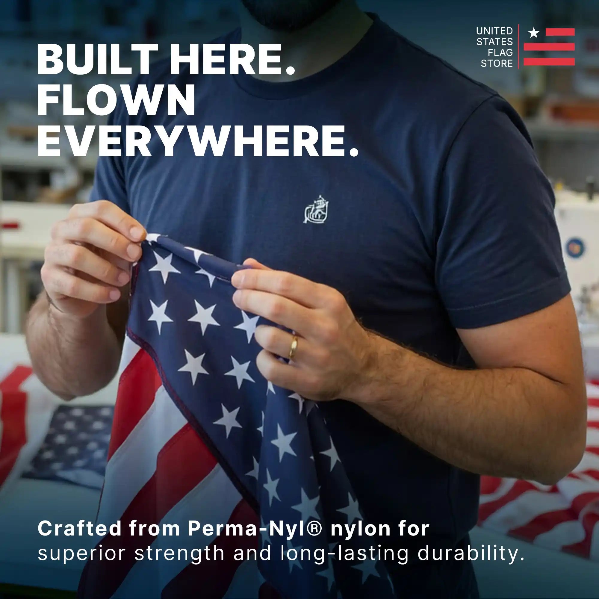 Person holding an American flag crafted from Perma-Nyl nylon for superior strength and durability. 
