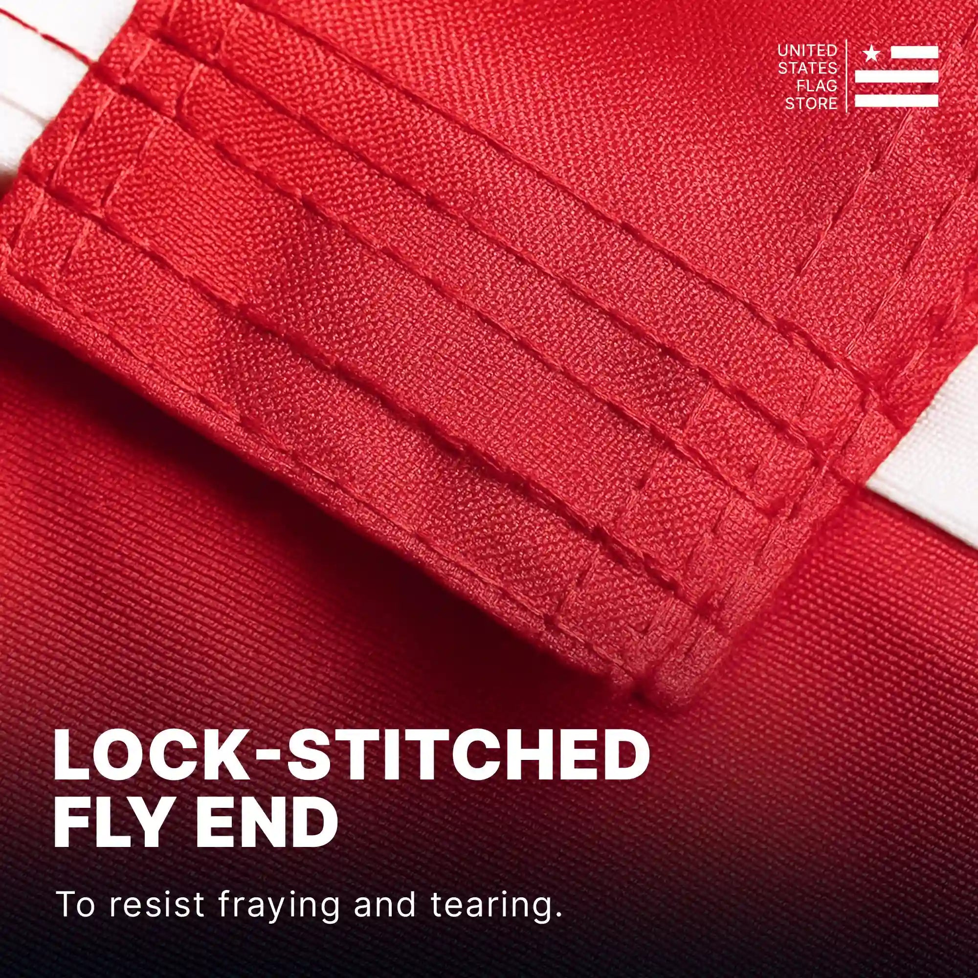 Macro view of a lock-stitched fly end on red flag fabric, specifically designed to resist fraying and tearing.