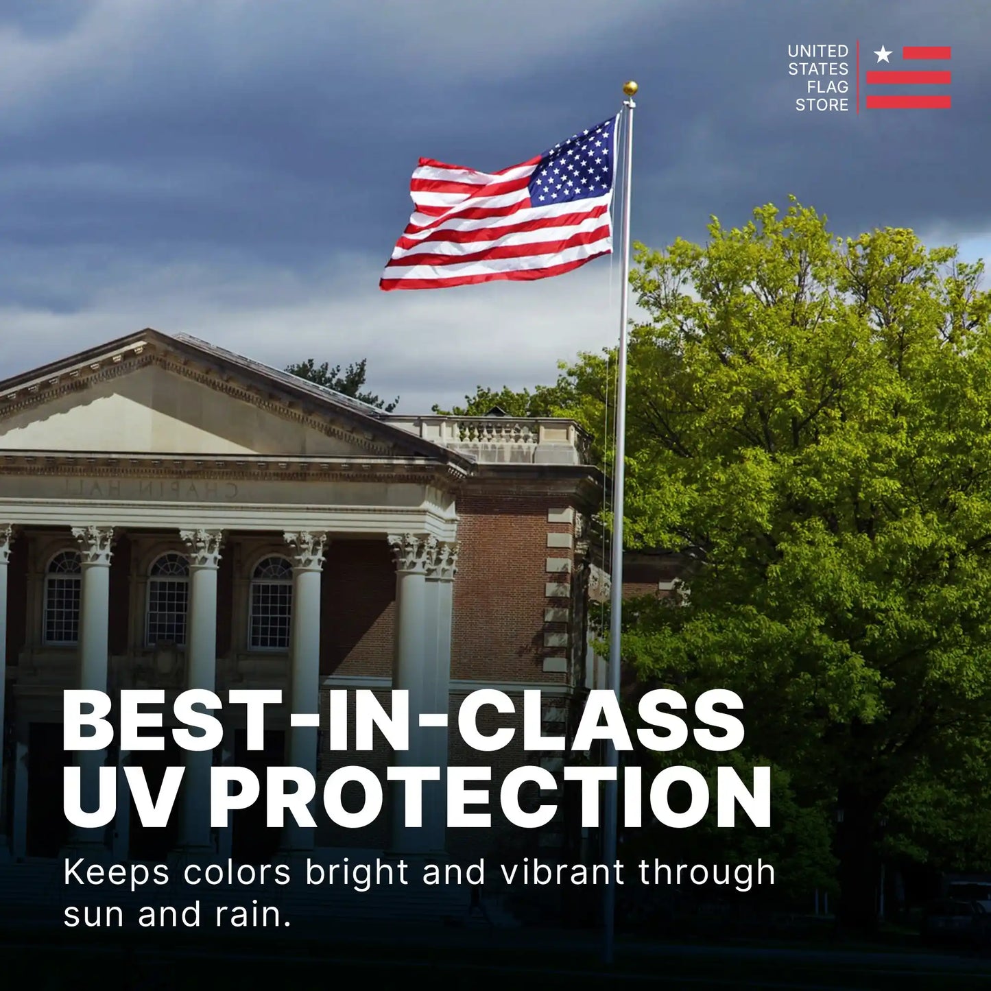 American flag flying on a tall flagpole with UV protection, keeping colors vibrant in sun and rain.