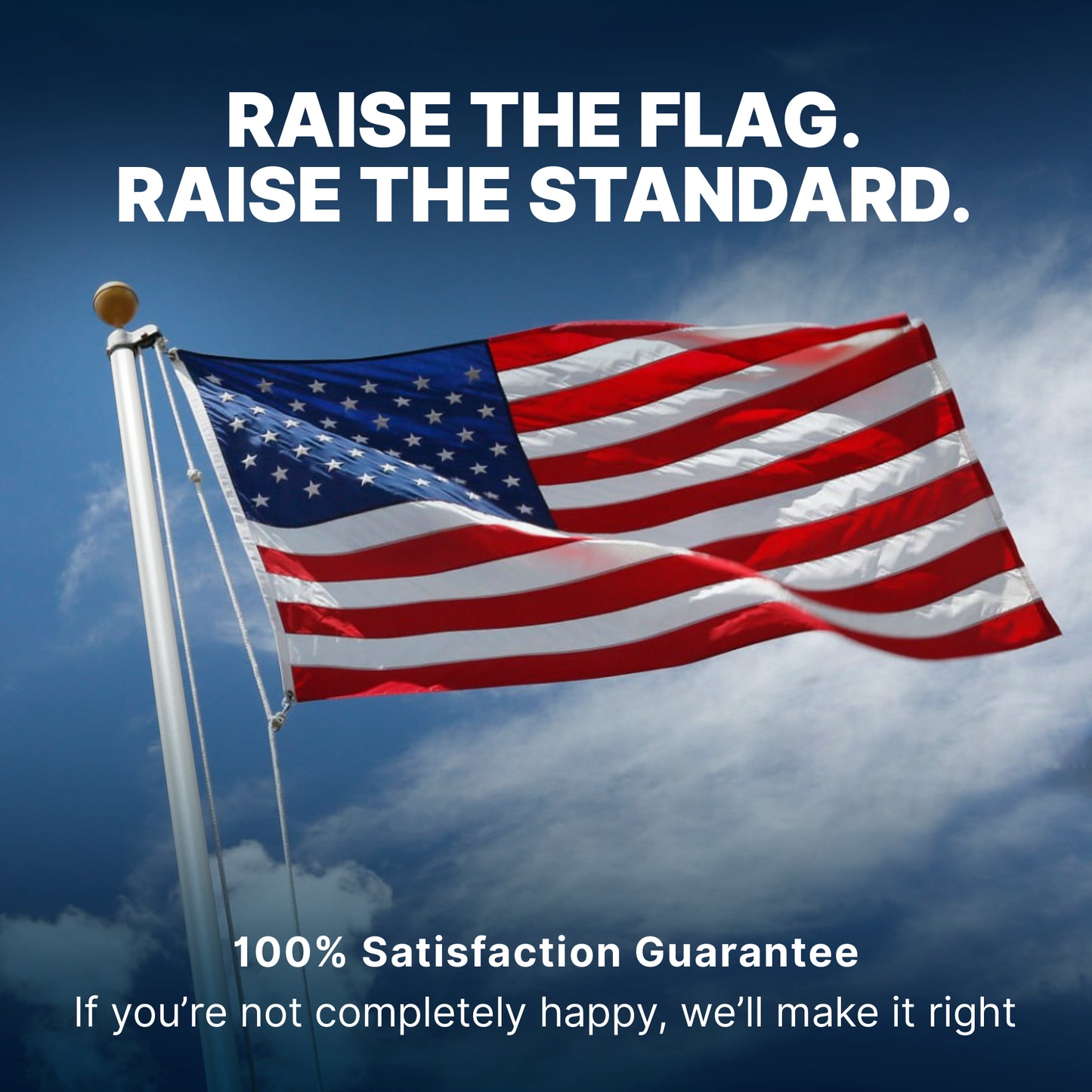 Close-up of an American flag waving on a white flagpole against a blue sky with a 100% satisfaction guarantee badge.