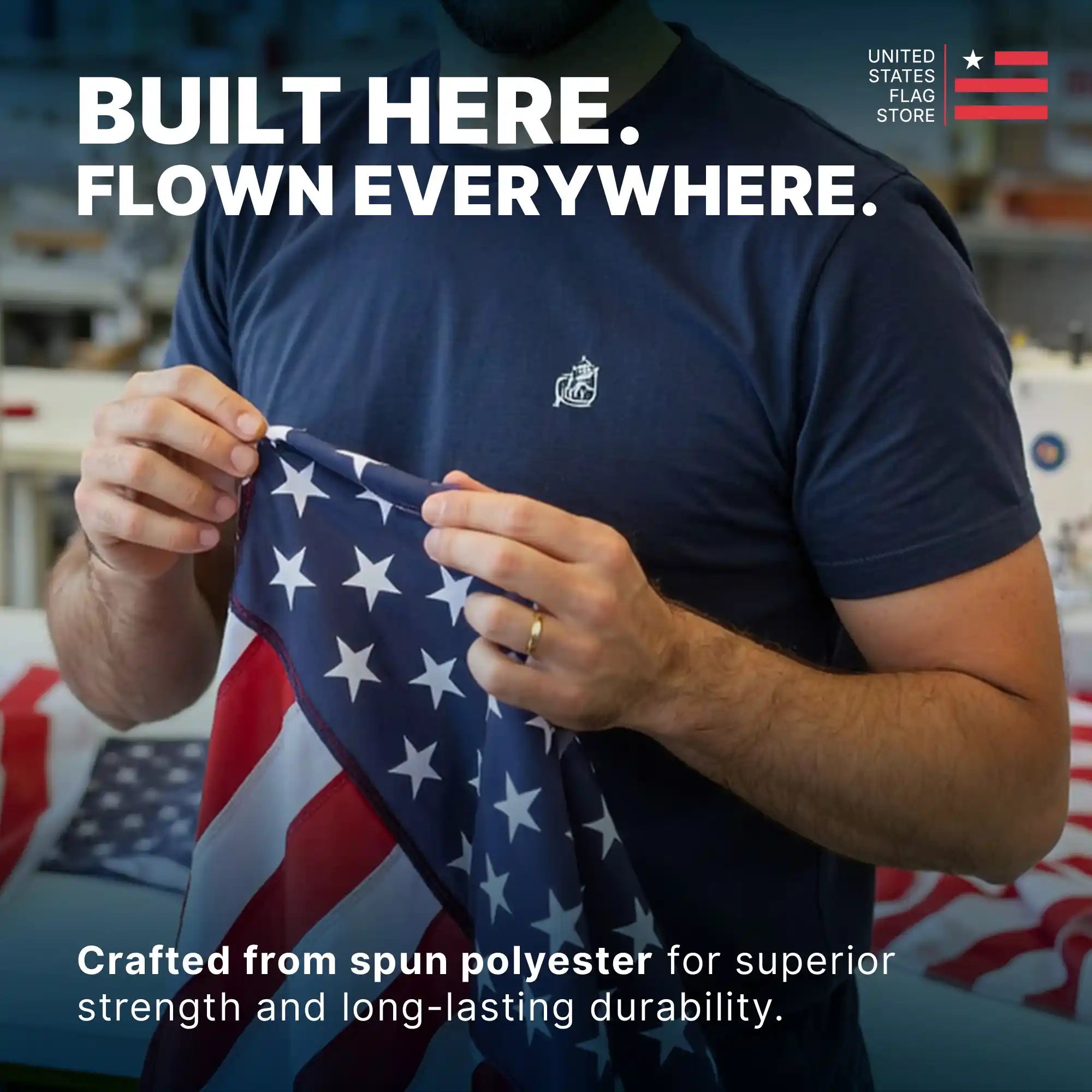 A craftsman inspecting an American flag made of spun polyester, emphasizing superior strength and long-lasting durability.
