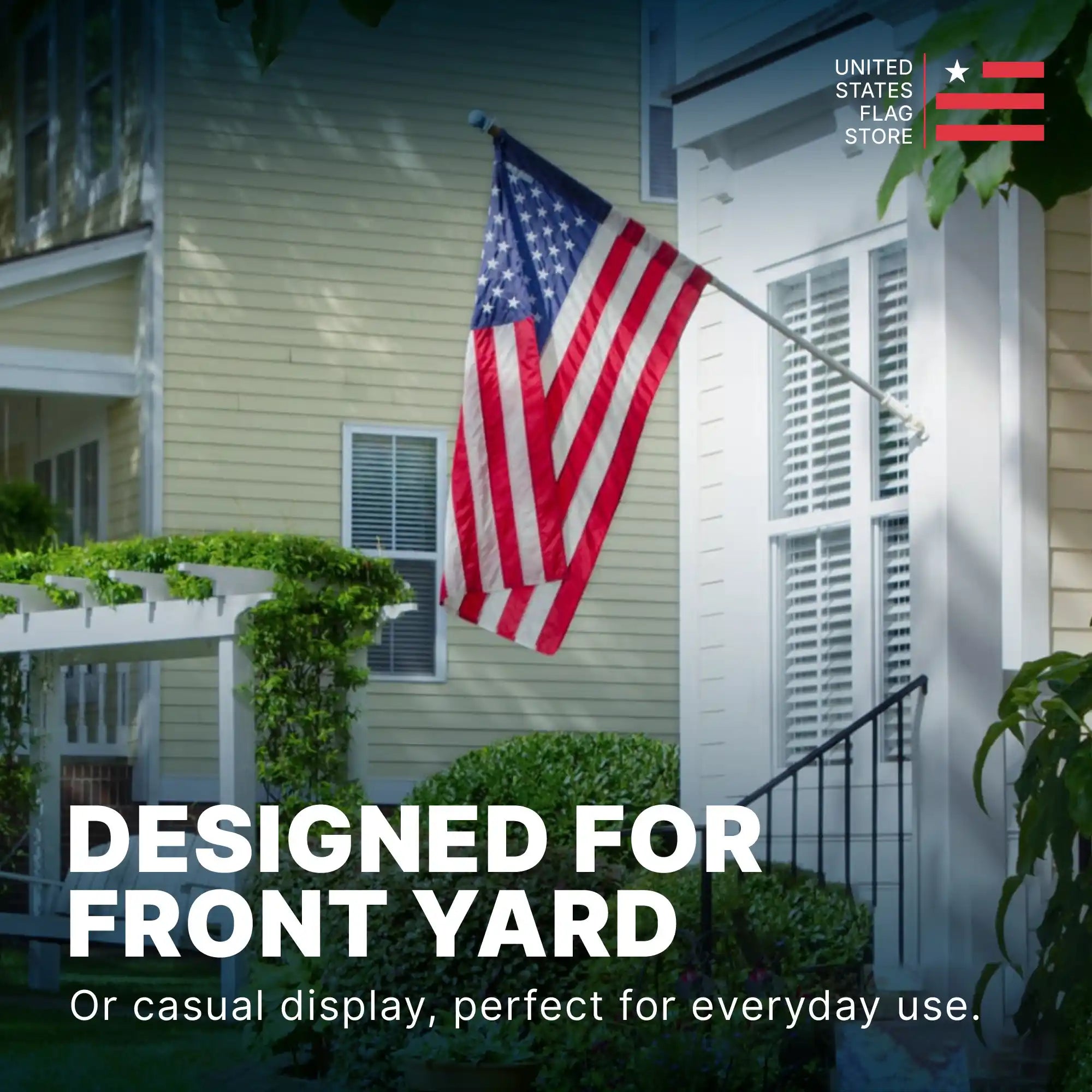 American flag displayed on a flagpole in a front yard setting, highlighting everyday outdoor use.