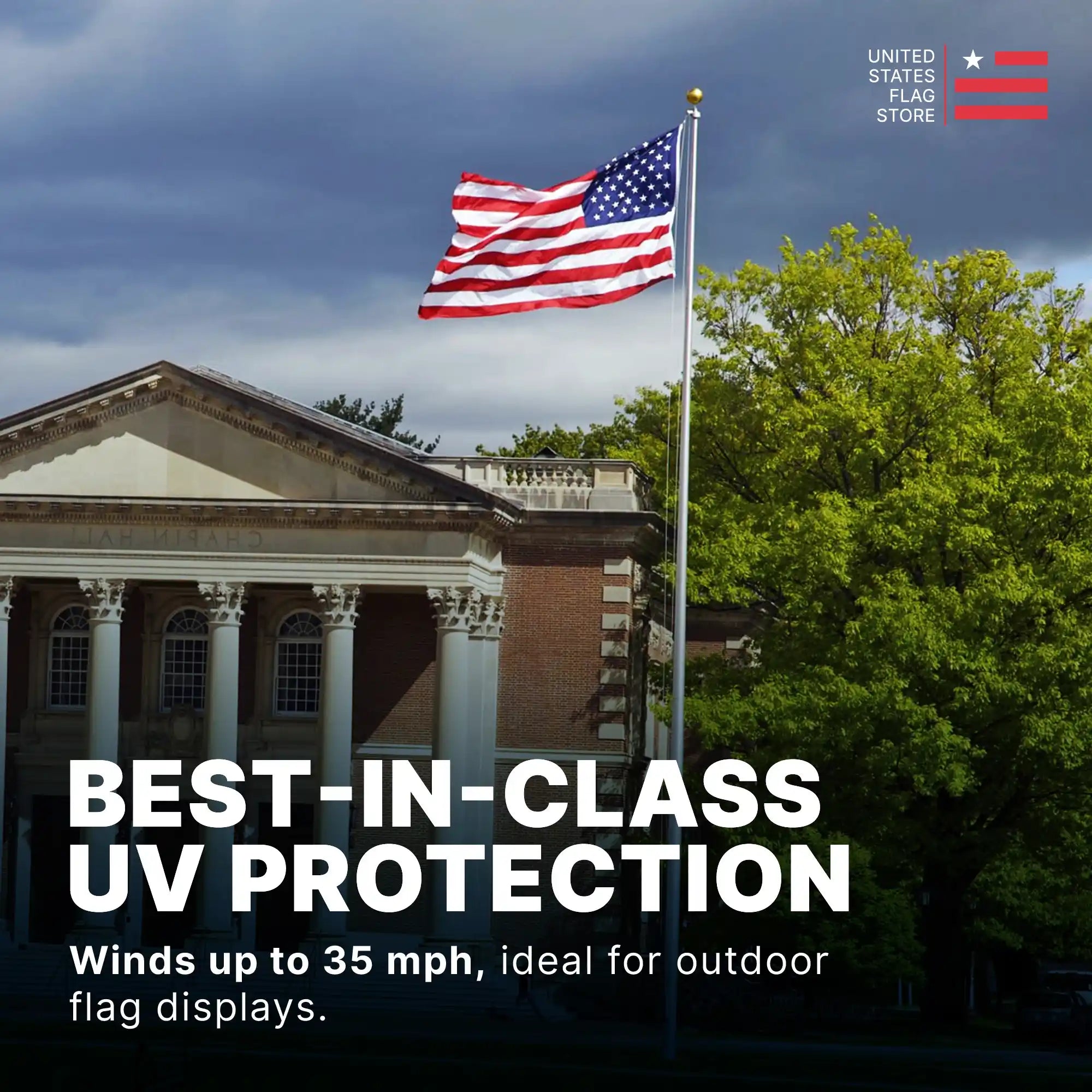 American flag flying on a tall pole, rated for winds up to 35 mph with best-in-class UV protection.