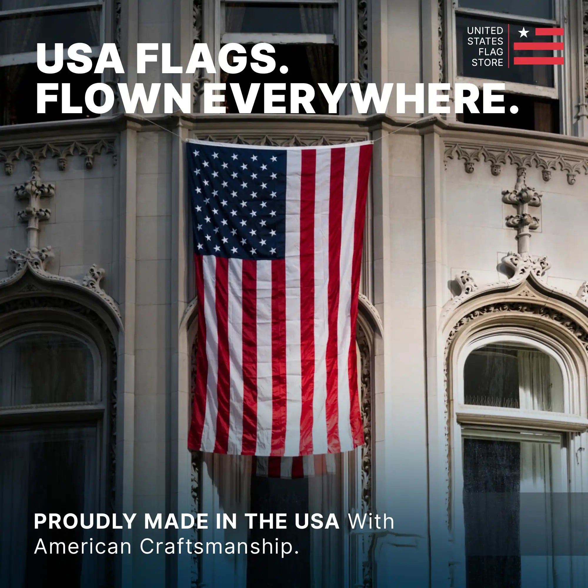 5ft x 8ft US flag hanging vertically from a grand stone building, showcasing American craftsmanship.