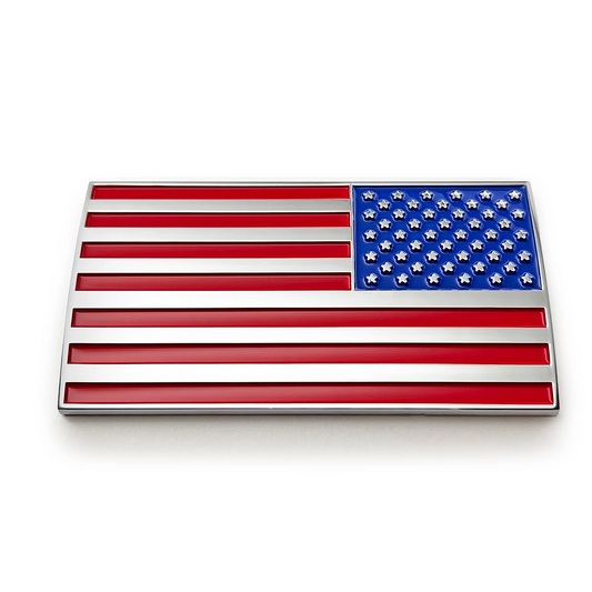A rectangular American flag emblem with a polished silver metallic border, featuring red and white stripes and a blue canton with white stars, shown on a clean white background.