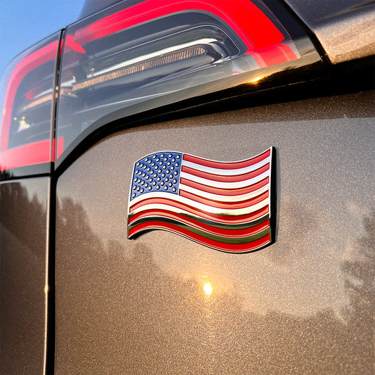The Wavy American Flag Car Badge - 3.8" x 2.5" All-Weather Emblem - Red, Blue & Chrome Finish