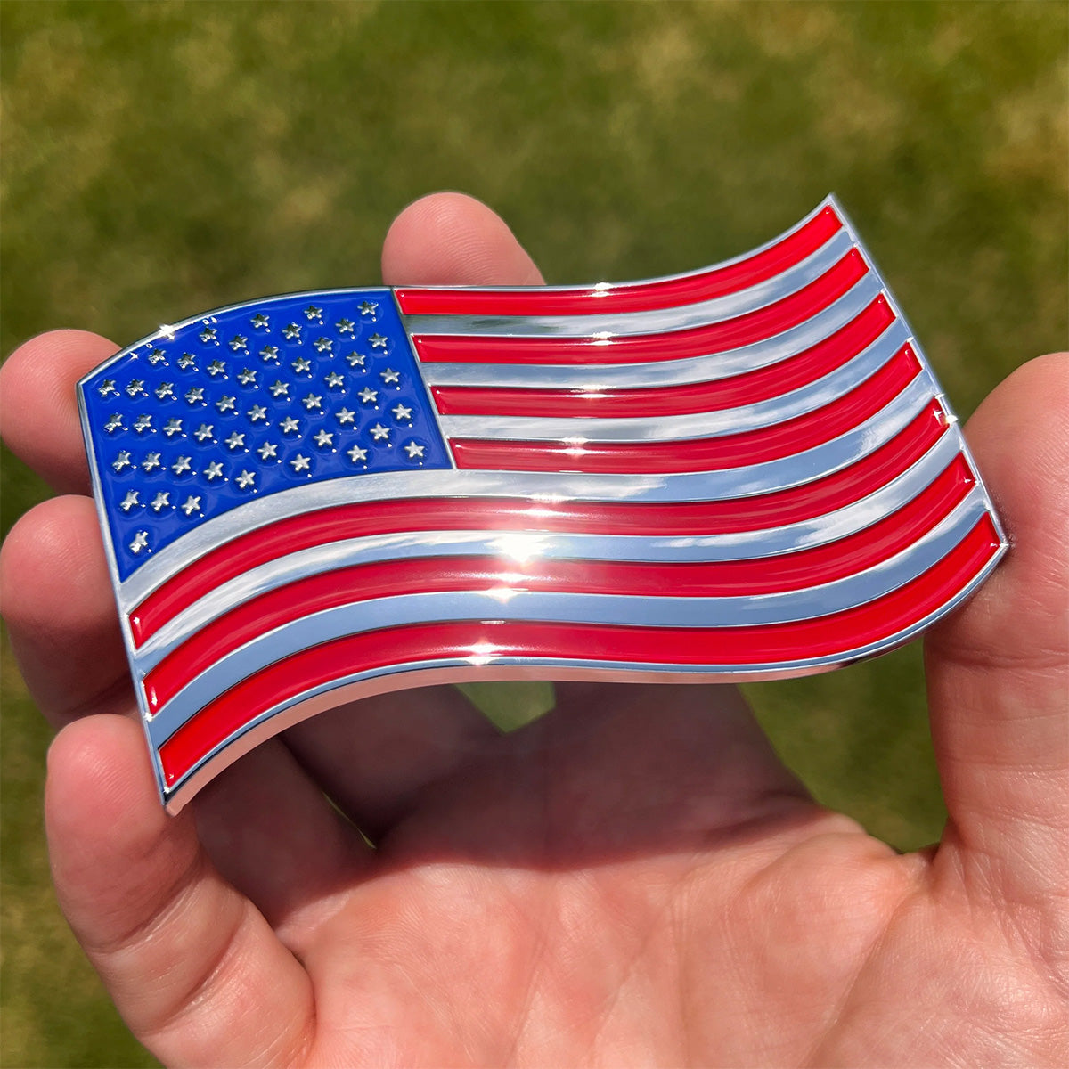 The Wavy American Flag Badge - 3.8" x 2.5" All-Weather Emblem - Red, Blue & Chrome Finish
