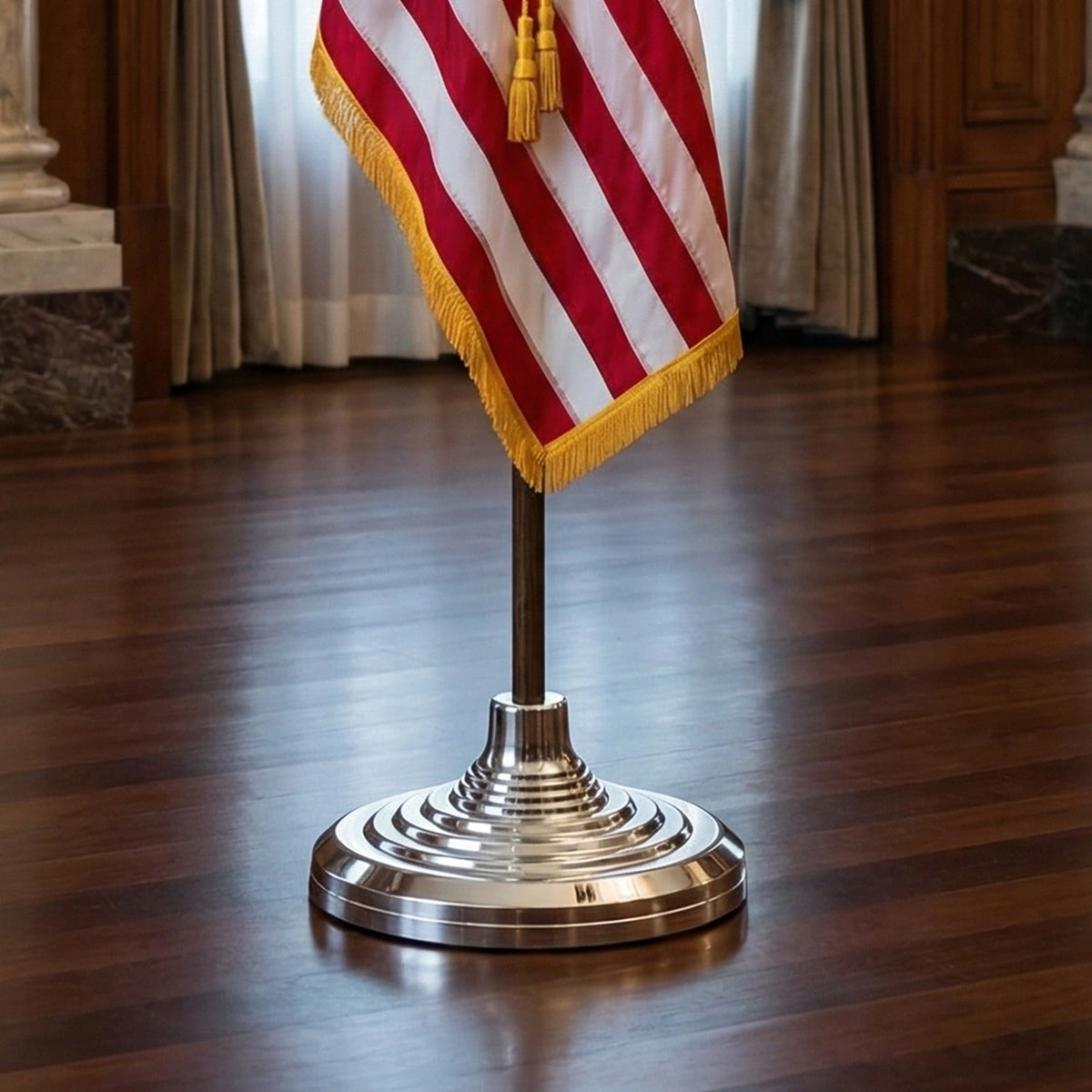 American flag on a stand in a formal setting with curtains in the background