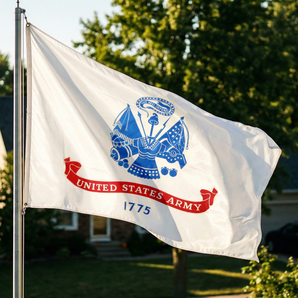 United States Army flag waving in the wind with trees in the background
