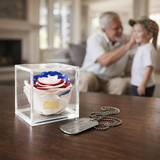 Clear cube with a decorative item on a table, with a blurred background of a living room.