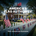 A white fence in a residential neighborhood with American Stick Flags and a call out for America's Flag Authority