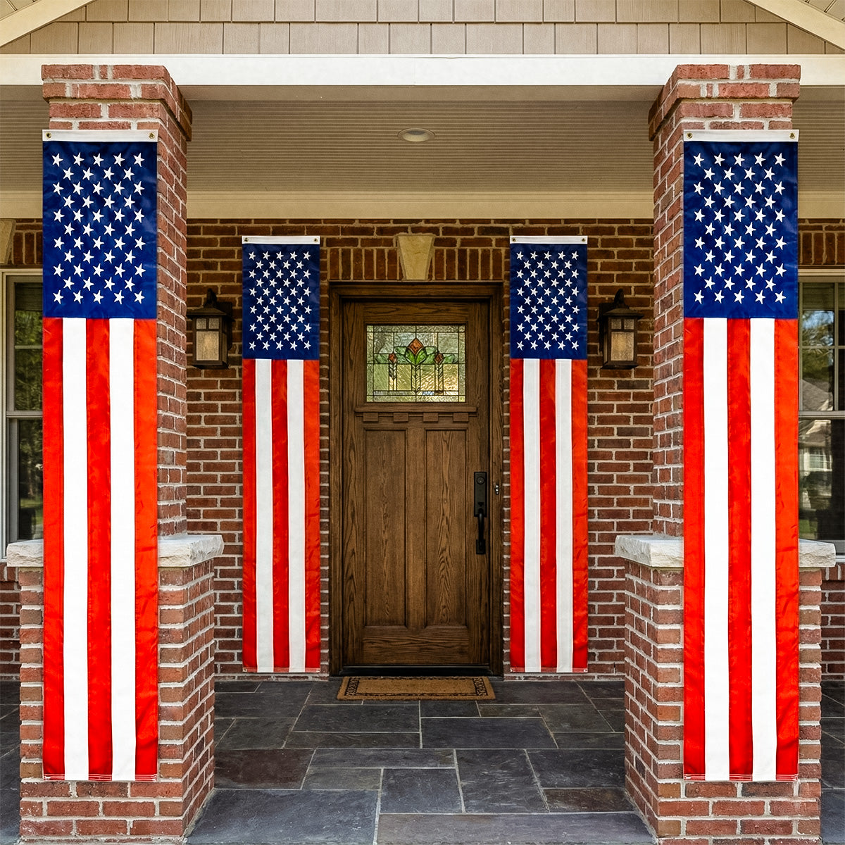 Front door with American flags on either side of the entrance.