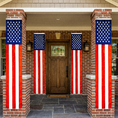 Front door with American flags on either side of the entrance.