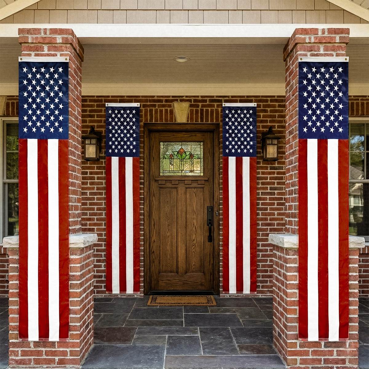Front door of a house with American flags on either side